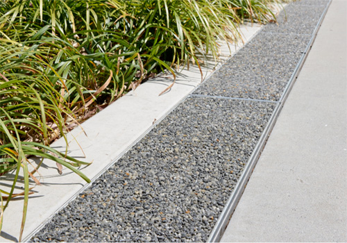 Linear permeable pavers